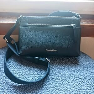 Calvin Klein Black Crossbody Bag with Silver Hardware. 11" wide, 7" long.